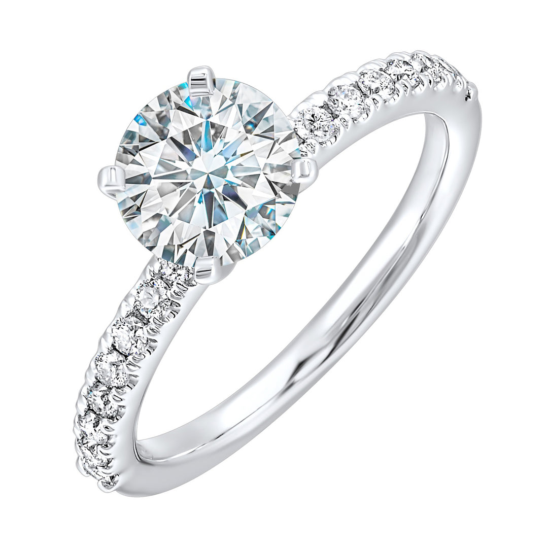 Classic and ready to make you shine, this ring features diamonds set in pave with a center solitare.