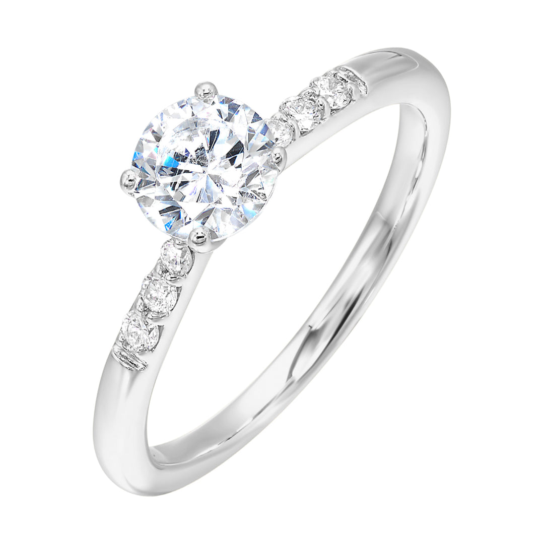 Complement your center diamond perfectly with accented pave-set diamonds along the shoulders of the shank.