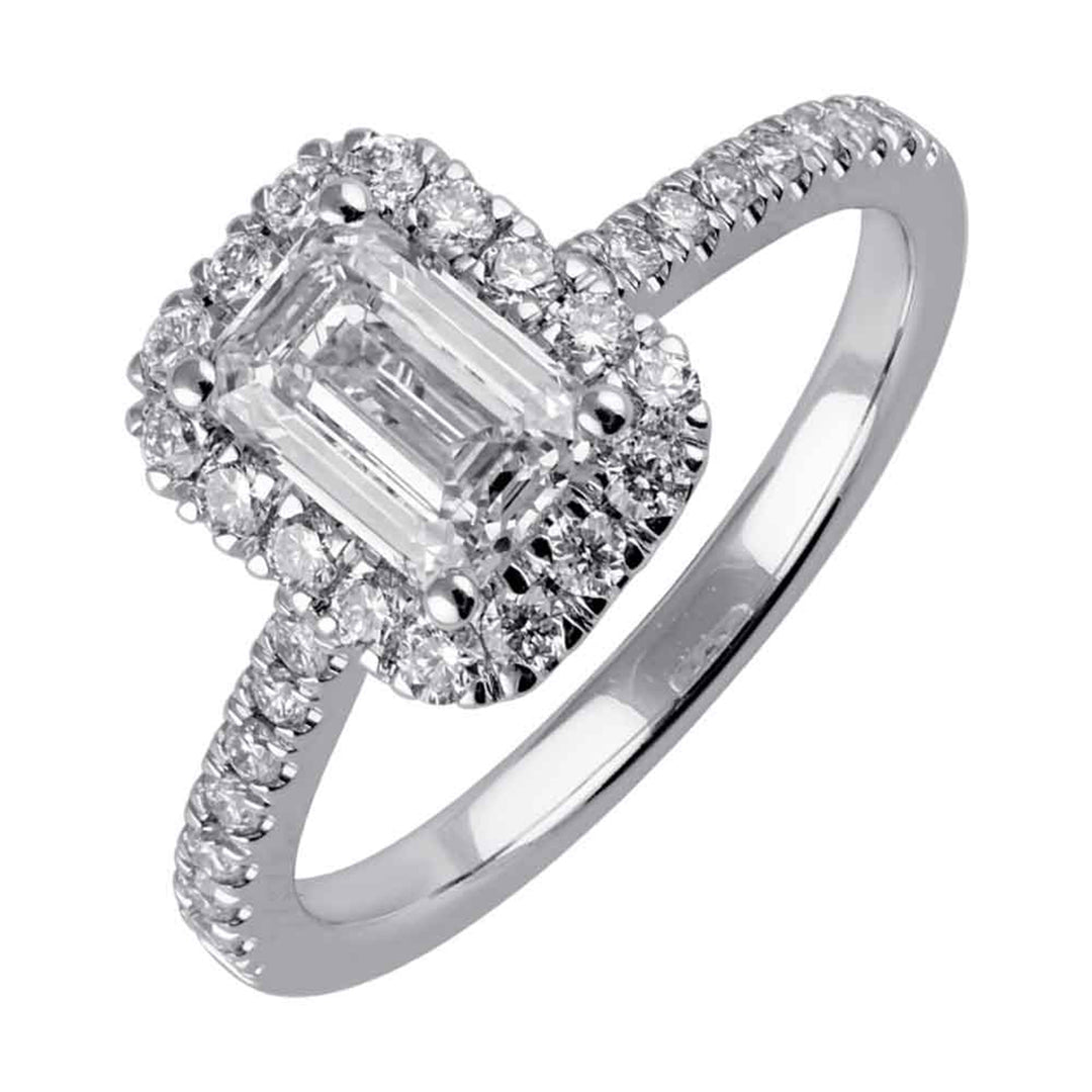 A beautiful emerald cut solitare set with halo of round diamonds and a diamond studded shank makes this perfect choice of your love story.