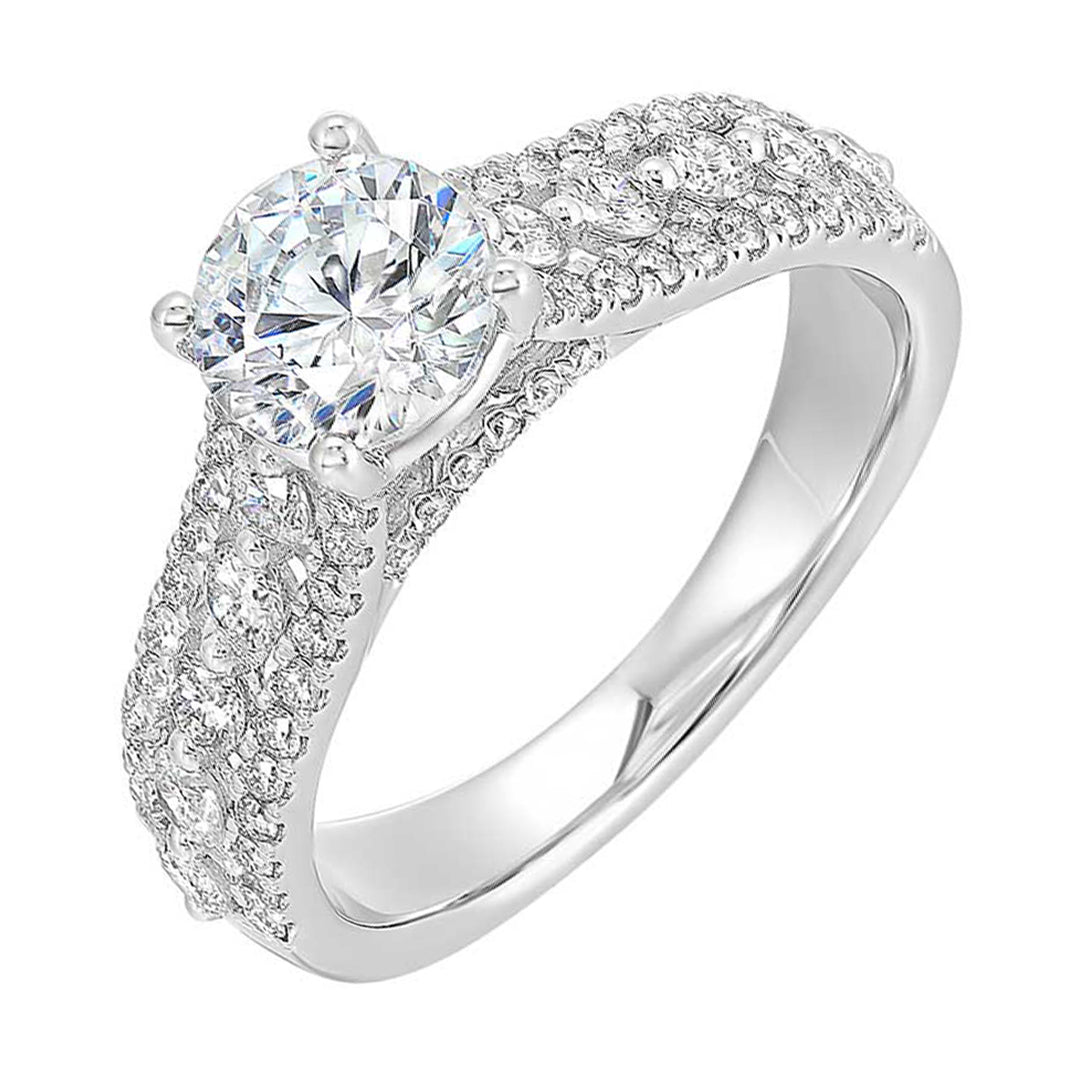 A triple row engagement ring with bigger diamond in center complemented by two micro row of diamonds on either side is perfect to sparkle your evening.